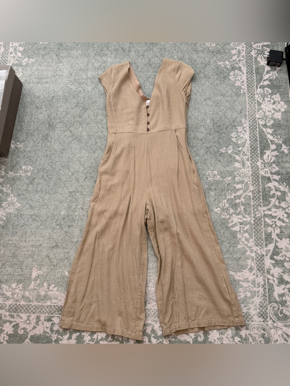 Princess Polly linen jumpsuit in tan.